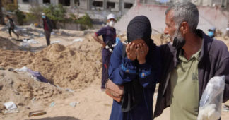 War on Gaza: At Nasser hospital’s mass grave, mothers look for signs of their sons